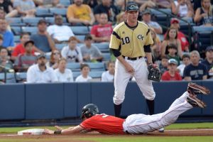 Here Gold is playing 3rd base while his 2014 Turk teammate, Daniel Nichols, slides in