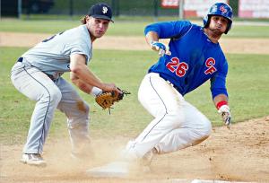 Khawam sliding into first base