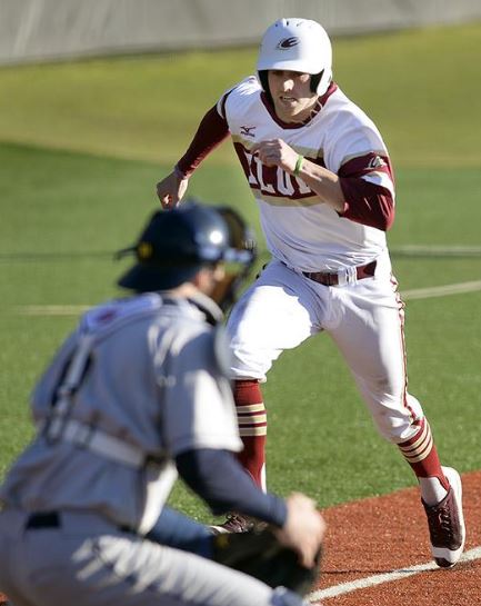 Kyle attempting to score for Elon in 2016